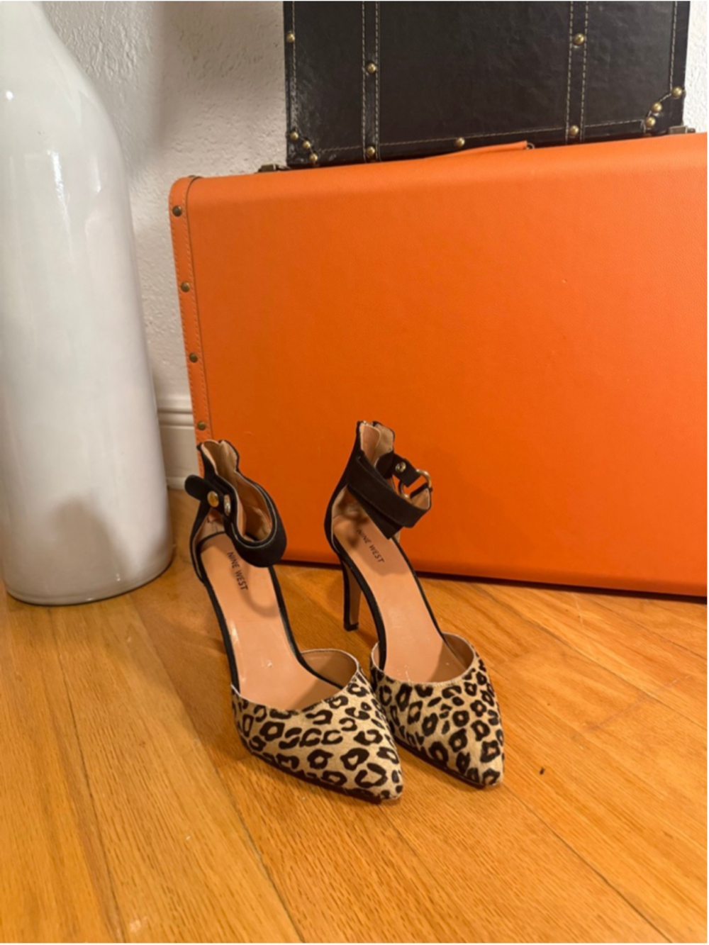 Preowned, Woman’s Nine West pointed-toe stiletto pumps, leopard print, size 9